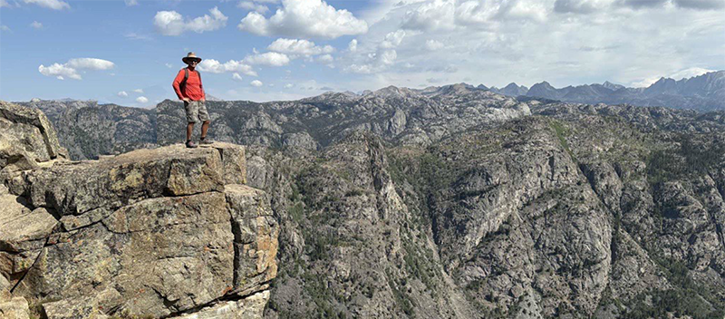 Paul, recovered and thriving, looks out over Sacred Rim, Wyoming